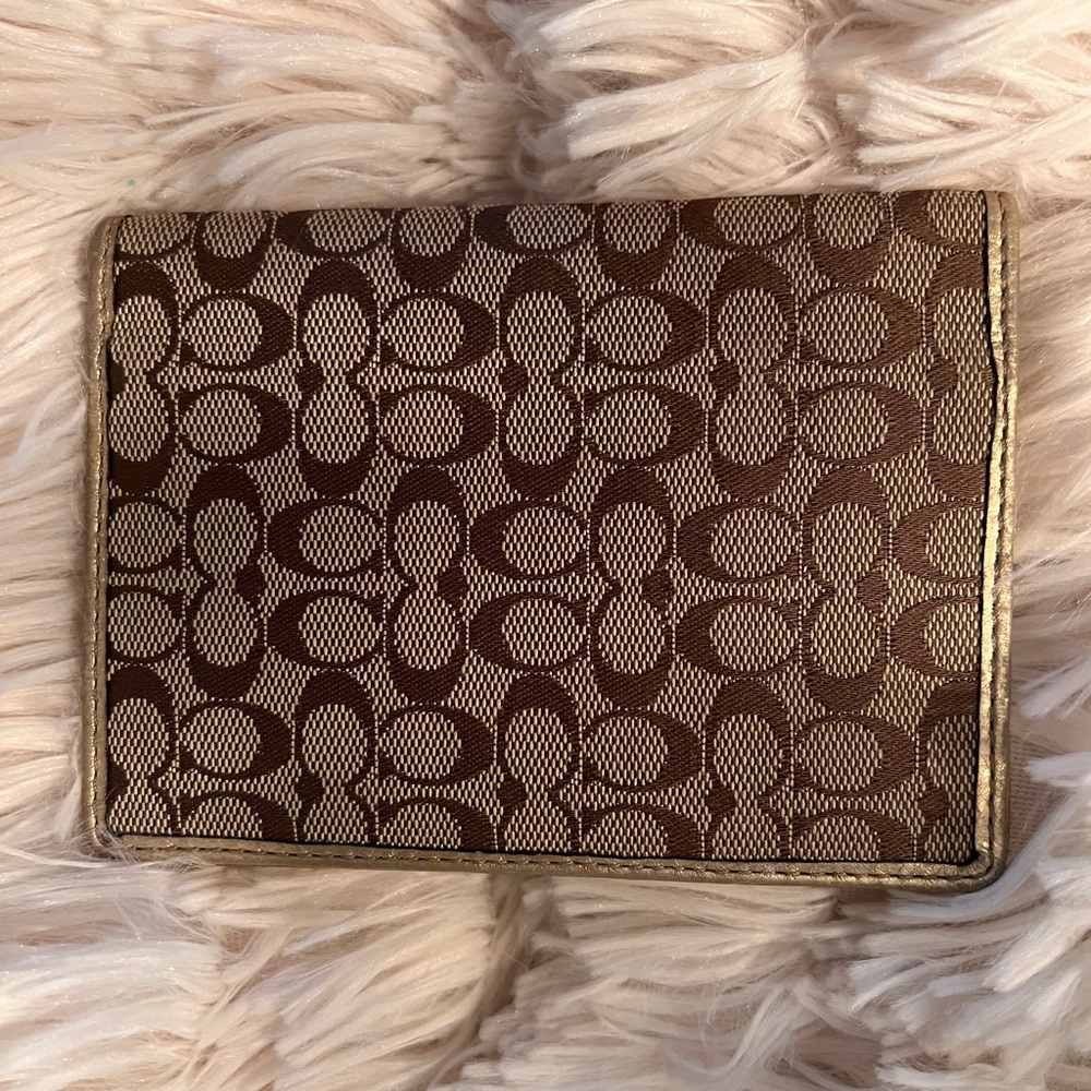 Coach Brown and gold signature passport case. In excellent condition.